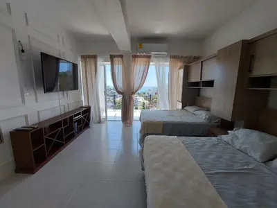Cama o camas de una habitación en Casa Blanca Grand