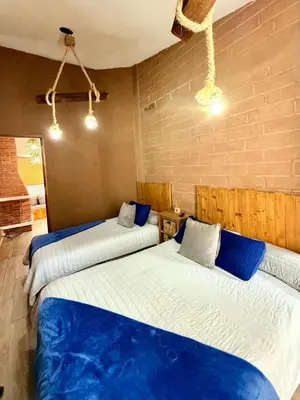 Cama o camas de una habitación en ESTANCIA 360 HERMOSA CABAÑA PARA PAREJA O FAMILIA