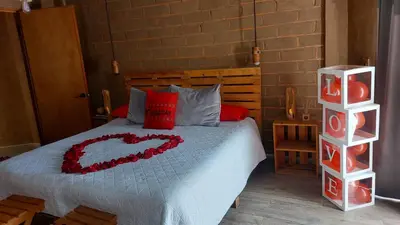 Cama o camas de una habitación en ESTANCIA 360 HERMOSA CABAÑA PARA PAREJA O FAMILIA