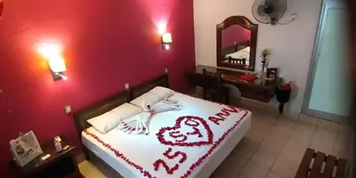 Cama o camas de una habitación en Hotel Aurora