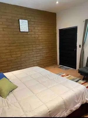 Cama o camas de una habitación en SUITE EL GUAYABO en Tepoztlán