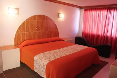 Cama o camas de una habitación en Hotel Plaza Sahagún