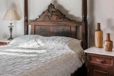 Cama o camas de una habitación en Hotel La Casa de las Sirenas