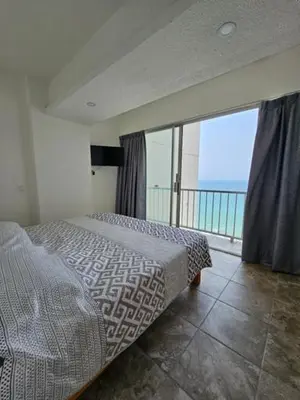 Cama o camas de una habitación en Apartamento Torres gemelas