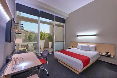 Cama o camas de una habitación en City Express Plus by Marriott Ciudad de México Patio Universidad