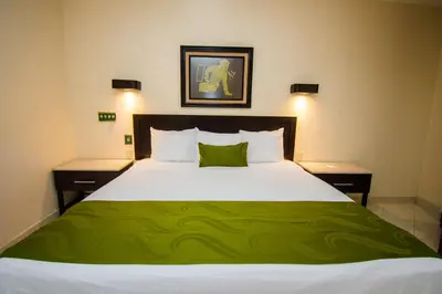 Cama o camas de una habitación en Eco City Hoteles