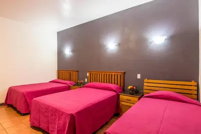 Cama o camas de una habitación en Hotel del Marquesado