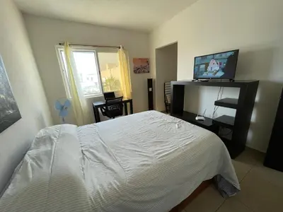 Una televisión o centro de entretenimiento en Casa de tus Sueños Dream Lagoons Veracruz