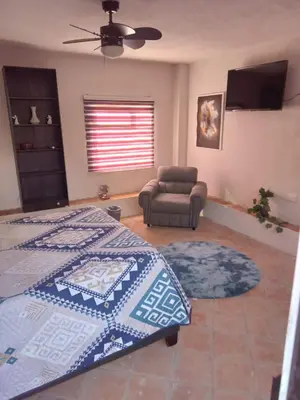 Una televisión o centro de entretenimiento en Jardín Quinta Las Fuentes Cabañas, Valsequillo. PUEBLA