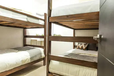Cama o camas de una habitación en **Con Club de Playa y Alberca : Hasta 18 huéspedes**