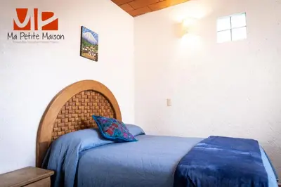 Cama o camas de una habitación en Ma Petite Maison