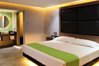 Cama o camas de una habitación en Auto-Hotel Playa Linda