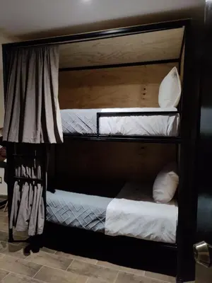 Cama o camas de una habitación en Hostería Tocali