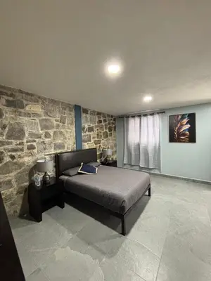 Cama o camas de una habitación en La Cabaña
