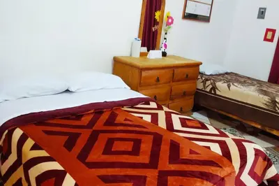 Cama o camas de una habitación en Tu Casita de descanso en Santa María
