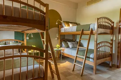 Cama o camas de una habitación en Departamento Mayan Island - A pie de playa y con albercas