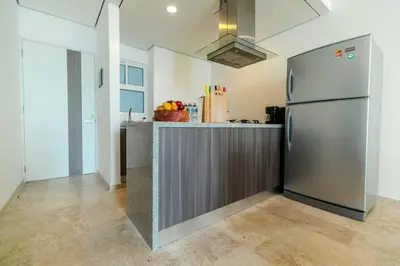 Una cocina o zona de cocina en Luxury apartment in front of Acapulco Beach