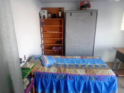 Cama o camas de una habitación en Estancia con entrada independiente en Zona Céntrica