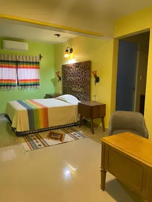 Cama o camas de una habitación en Suites Cárdon