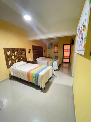 Cama o camas de una habitación en Suites Cárdon