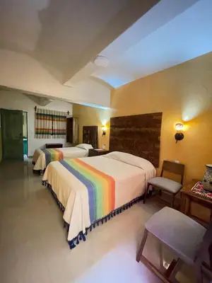 Cama o camas de una habitación en Suites Cárdon