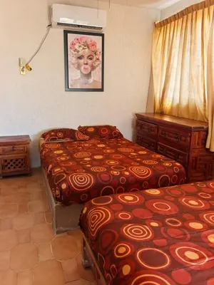 Cama o camas de una habitación en Bahía 50's