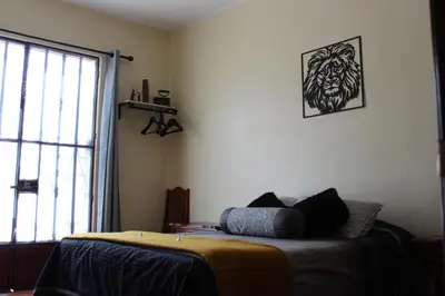Cama o camas de una habitación en Habitaciones 1 acceso independiente y autonomo Puebla