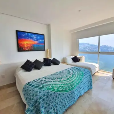 Cama o camas de una habitación en Apartamento Frente al Mar en Acapulco