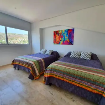 Cama o camas de una habitación en Apartamento Frente al Mar en Acapulco