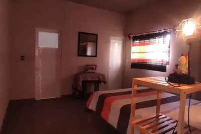 Cama o camas de una habitación en Casa de huéspedes con lo que necesitas para ti