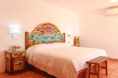 Cama o camas de una habitación en Hotel Rosa Mexicano