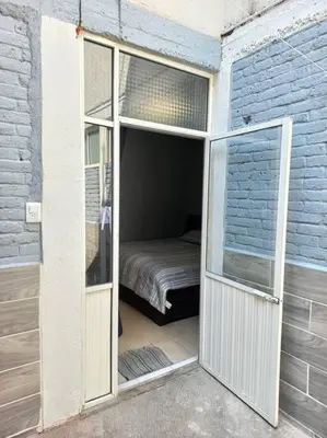 Cama o camas de una habitación en Apartamento a minutos caminando del Aeropuerto CDMX Terminal 1