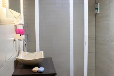 Un baño de Habitación triple zona centro