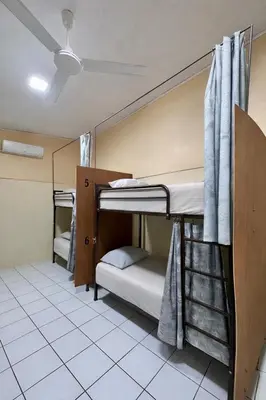 Cama o camas de una habitación en Huitzilin Hostal