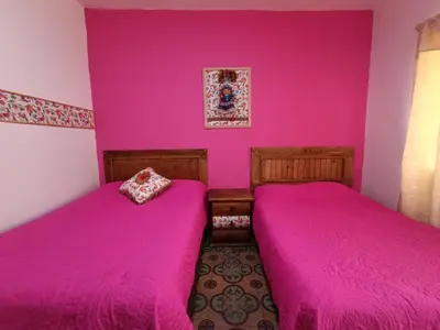 Cama o camas de una habitación en Posada Casa Mexicana Jamaica
