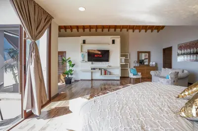 Cama o camas de una habitación en Casa El Mirador Taxco