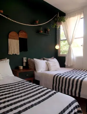Cama o camas de una habitación en Hotel San Martin La Punta