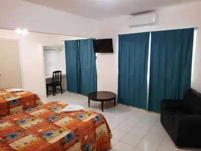 Cama o camas de una habitación en HOTEL ACUARIO CATEMACO