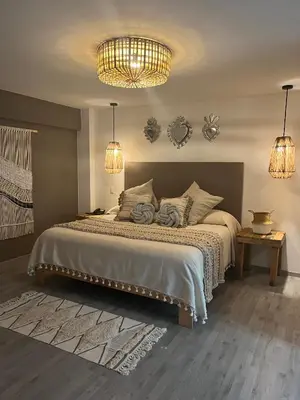 Cama o camas de una habitación en Zen Suites by Regente