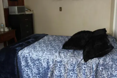 Cama o camas de una habitación en Habitacion 2 acceso independiente y autonomo Puebla