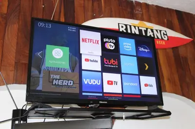 Una televisión o centro de entretenimiento en Habitacion 2 acceso independiente y autonomo Puebla