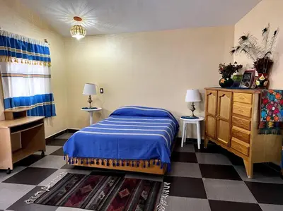 Cama o camas de una habitación en Casa Carmín en Teotitlán