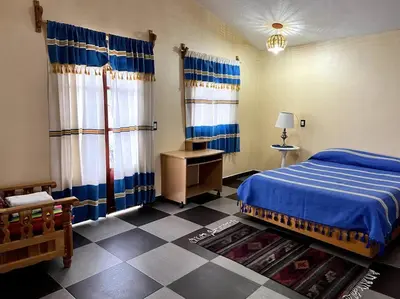 Cama o camas de una habitación en Casa Carmín en Teotitlán