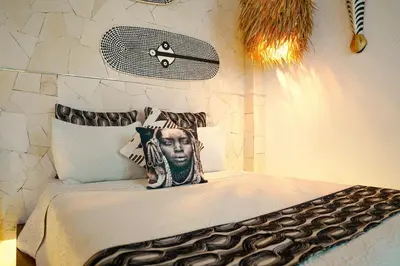 Cama o camas de una habitación en Muúnek Hotel Boutique Art & Spa, adults only