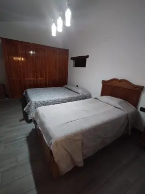 Cama o camas de una habitación en Hermosos departamentos en el centro de Coatepec Veracruz