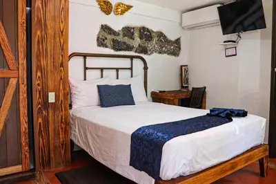 Cama o camas de una habitación en Casa Real Coyoacán
