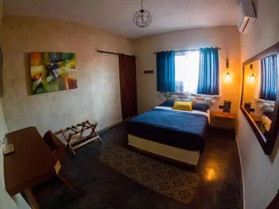Cama o camas de una habitación en relax hotelito