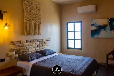 Cama o camas de una habitación en relax hotelito