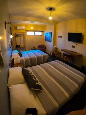 Cama o camas de una habitación en relax hotelito