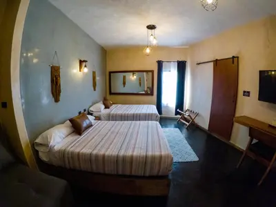 Cama o camas de una habitación en relax hotelito